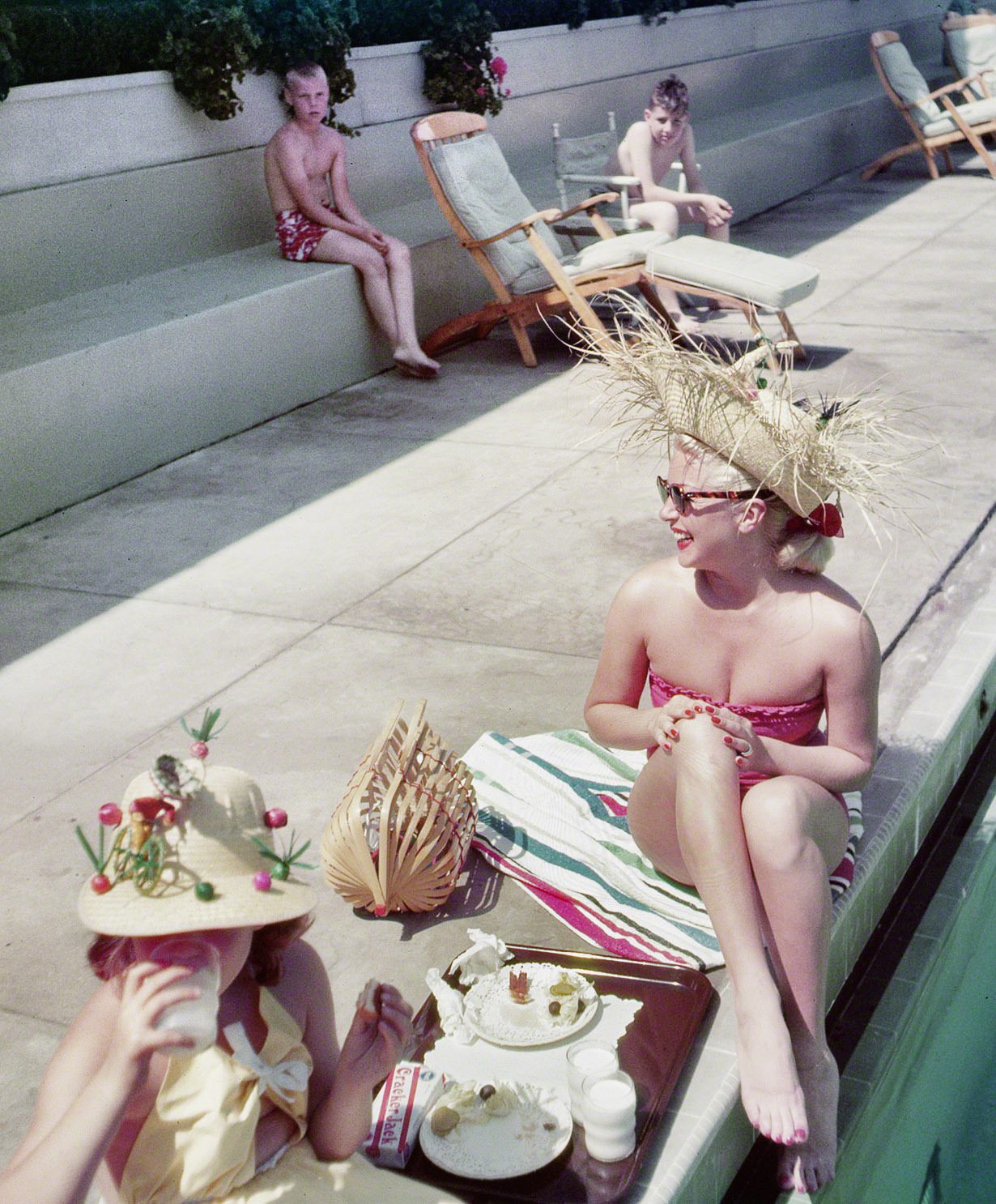 Lana Turner lunching by pool at the Coral Casino