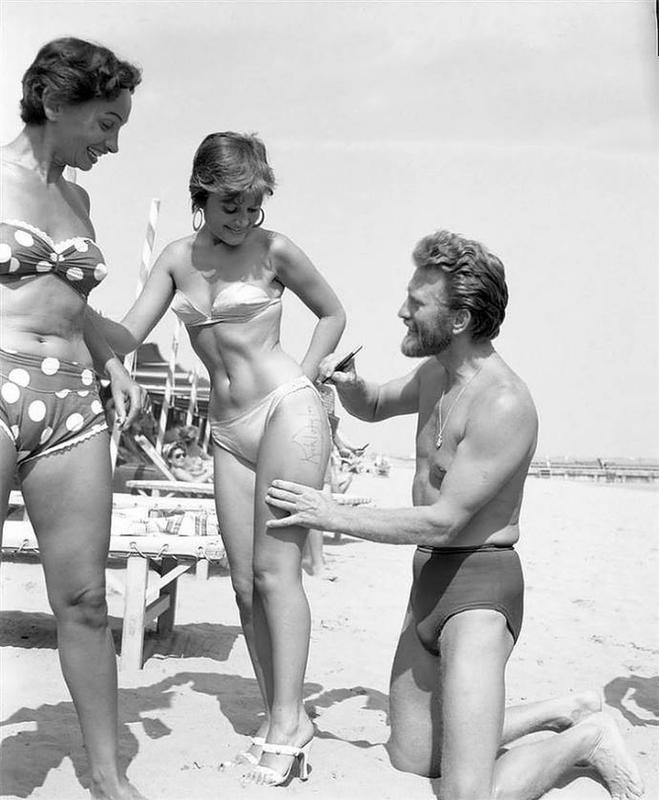 Kirk Douglas Picking up chicks on the beach 1953