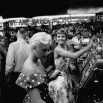 1950s chorus girl Kim Smith and her roommate hitting the casinos in Las Vegas 1954 and (below) playing on the slot machines