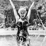 Janet Leigh having a splash at home in 1955.