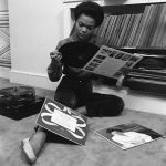 Eartha Kitt and record collection in her Los Angeles home in 1957.
