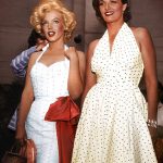 Marilyn Monroe and Jane Russell moments after making their handprints at Grauman’s Chinese Theater, June 1953. Photo by Murray Garett.