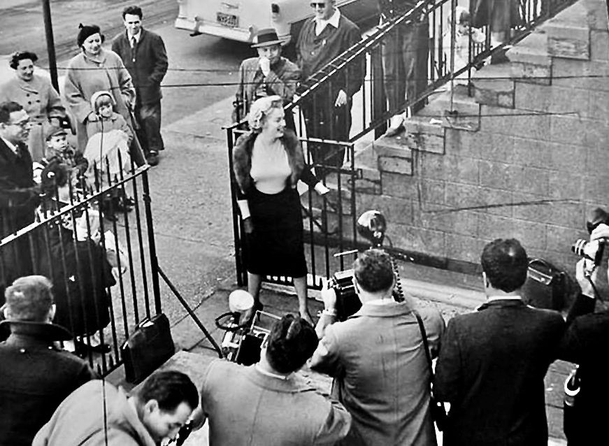 Marilyn Monroe outside of the Actors Studio in New York, 1956.