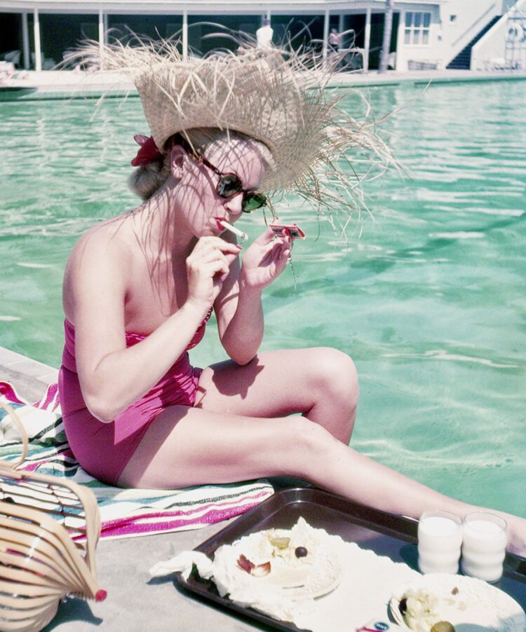 Lana Turner lunching by pool at the Coral Casino, Santa Barbara, California, photographed by Earl Theisen for Look magazine, 1951
