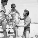 Kirk Douglas Picking up chicks on the beach 1953