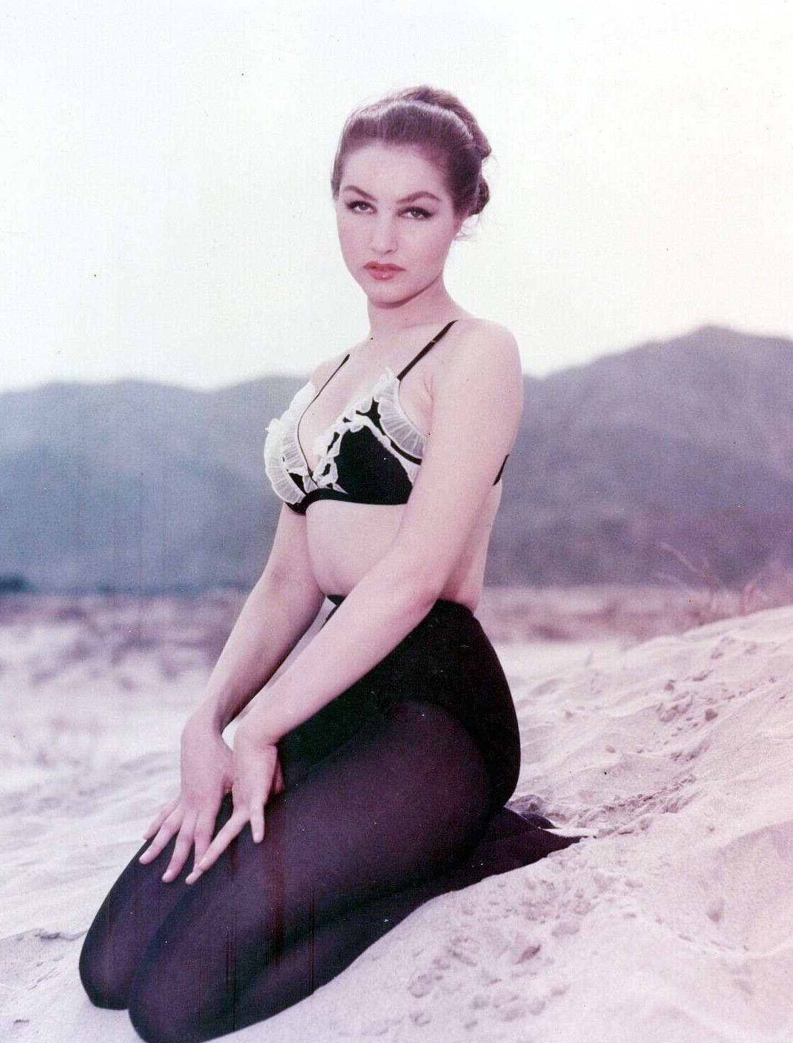 Julie Newmar on the sand
