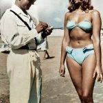 A-police-officer-issuing-a-woman-a-ticket-for-wearing-a-bikini-on-a-beach-at-Rimini-Italy-Emilia-Romagna-region-Rimini-1957-_lwQtp__please_credit[palette.fm]