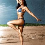 Bettie Page showing off on the beach