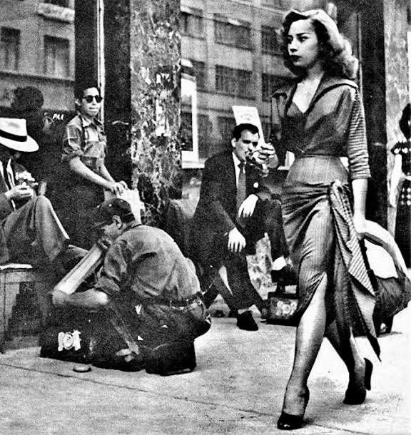 Woman walking the streets of Mexico City, circa 1950