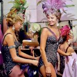 Showgirls touching up